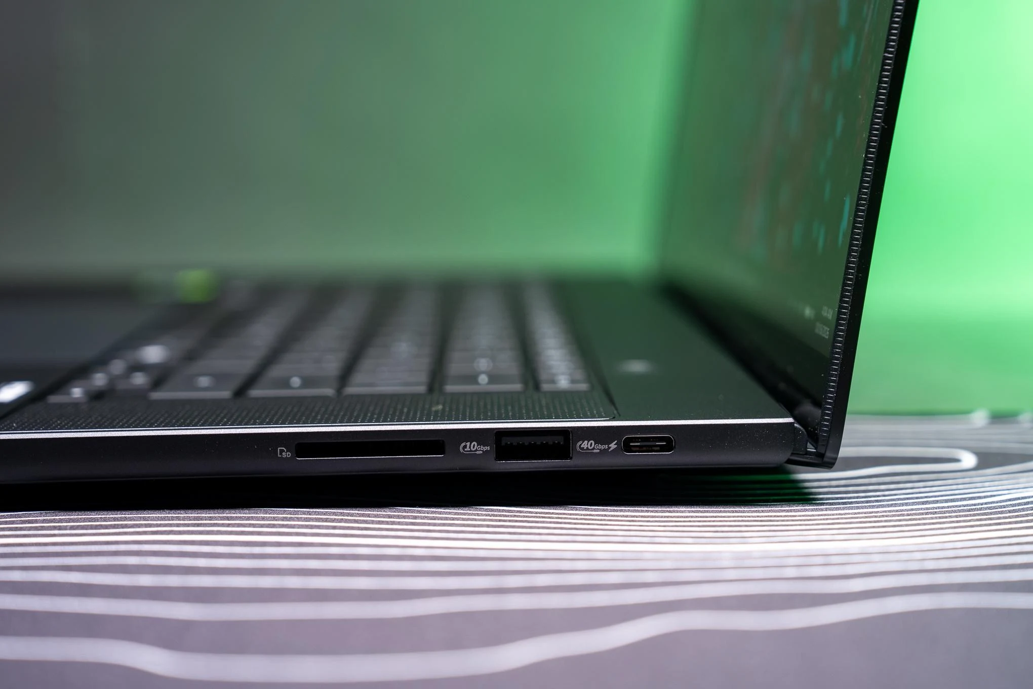 The Asus ProArt has three high-speed USB-C ports, a USB-A, HDMI 2.1, and an SD card slot.