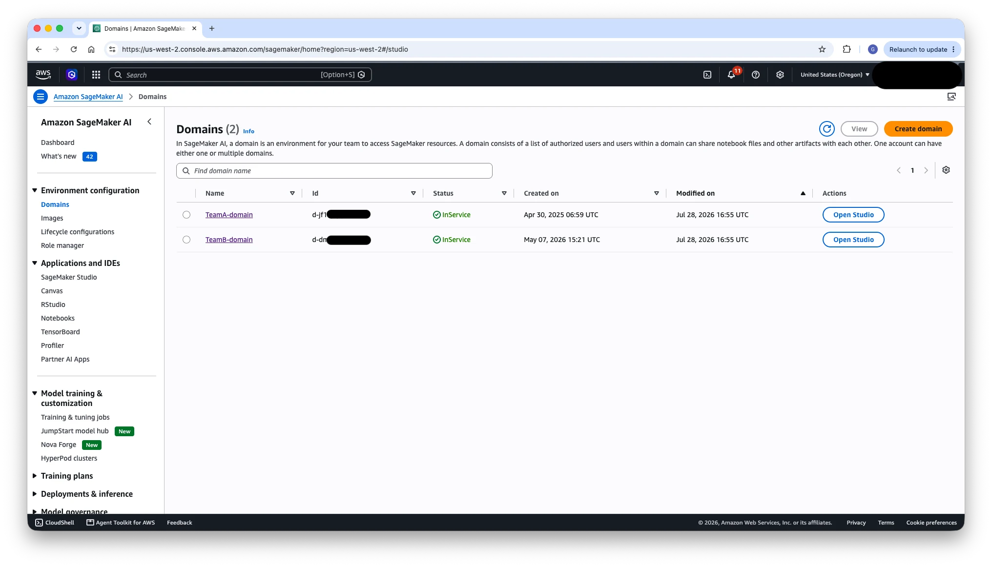 SageMaker console listing TeamA-domain and TeamB-domain