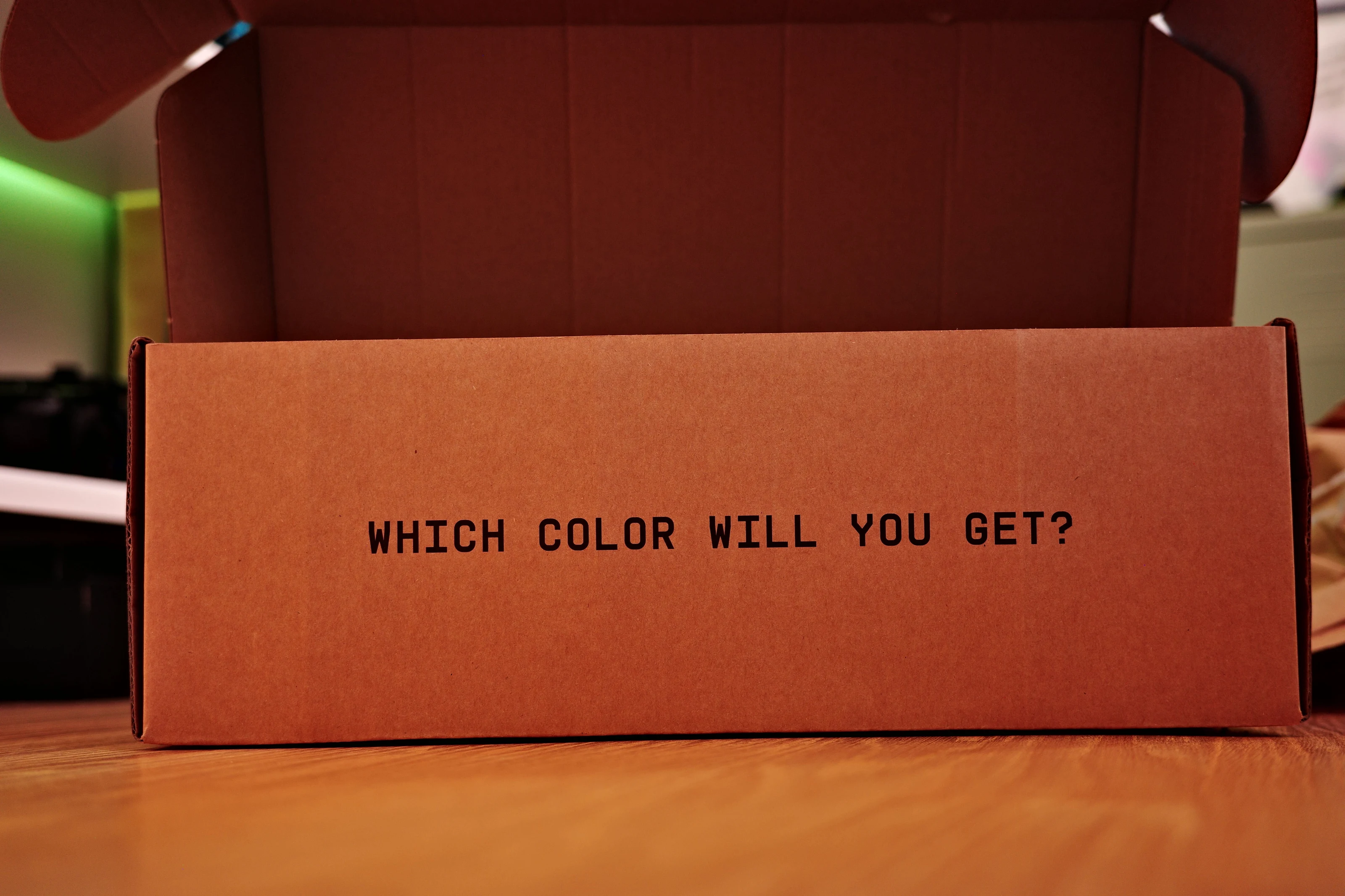 Box for the Github Universe keyboard. It says "Which color will you get?"